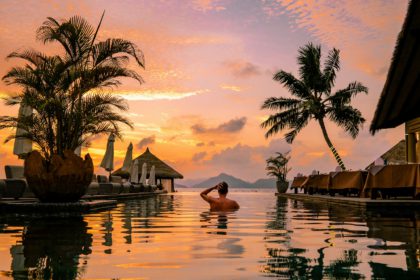 Luxury swimming pool in tropical resort, relaxing holidays in Seychelles islands